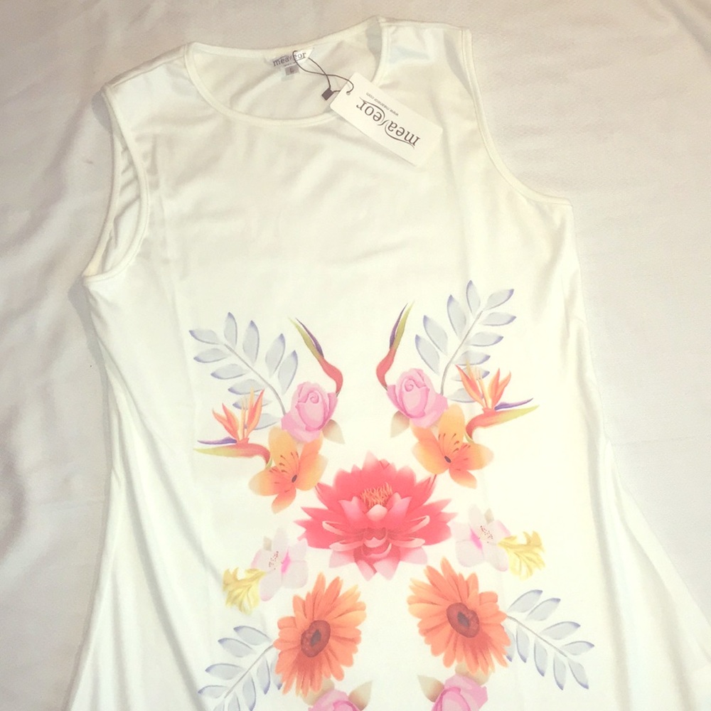 NWT white shift dress with floral print on front.